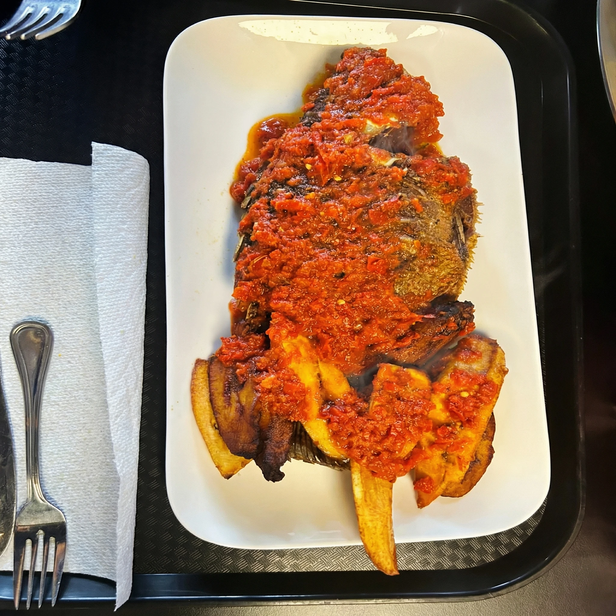 Authentic Nigerian jollof rice dish at The Tantalizers African House Edmonton